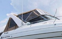 Photo of Glastron GS 279, 2004: under Radar Arch Bimini Top, Front Connector, Side Curtains, Camper Top, Camper Side and Aft Curtains Beige Sunbrella, viewed from Starboard Front 